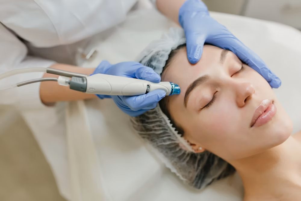 A patient receiving a professional facial treatment in a calm aesthetic clinic